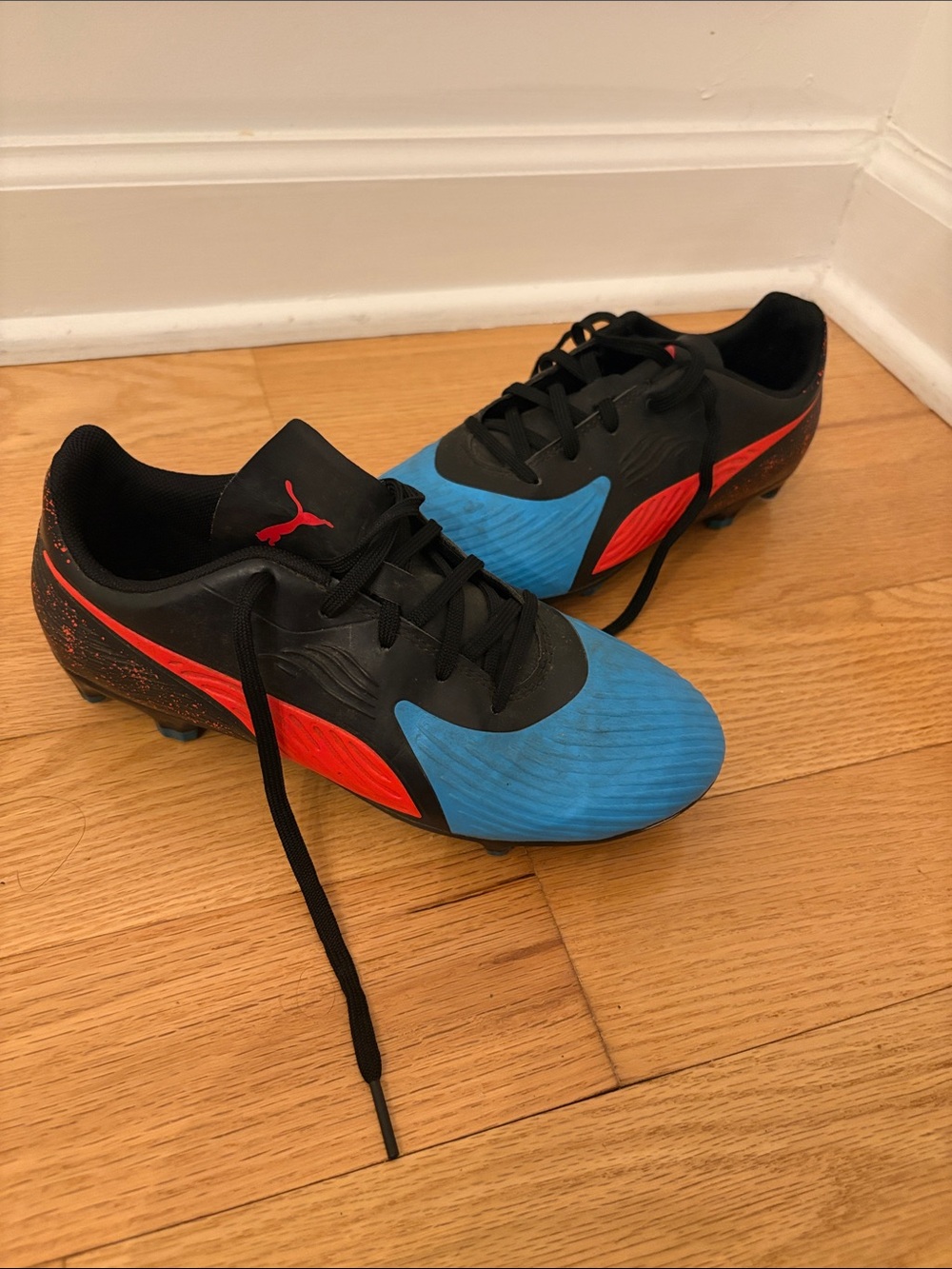 Puma Kids Black, Blue and Red Soccer Cleats
